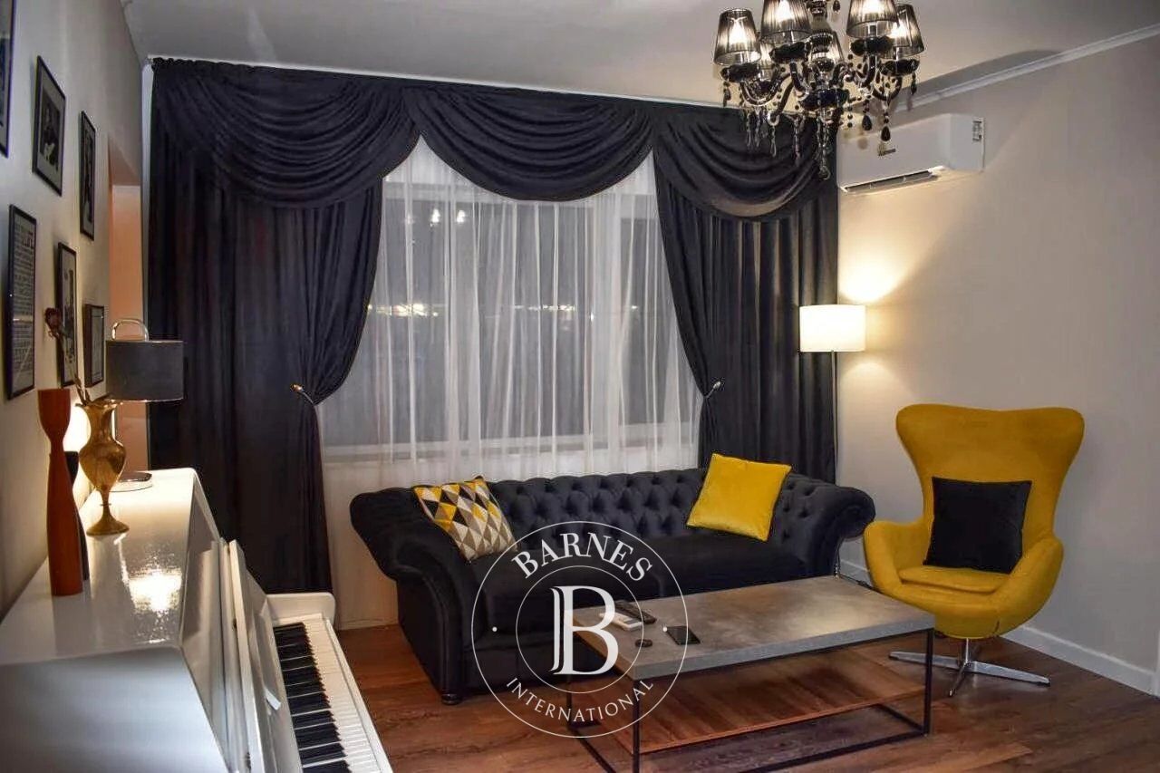 Artistically furnished apartment with a courtyard in the city center - picture 1