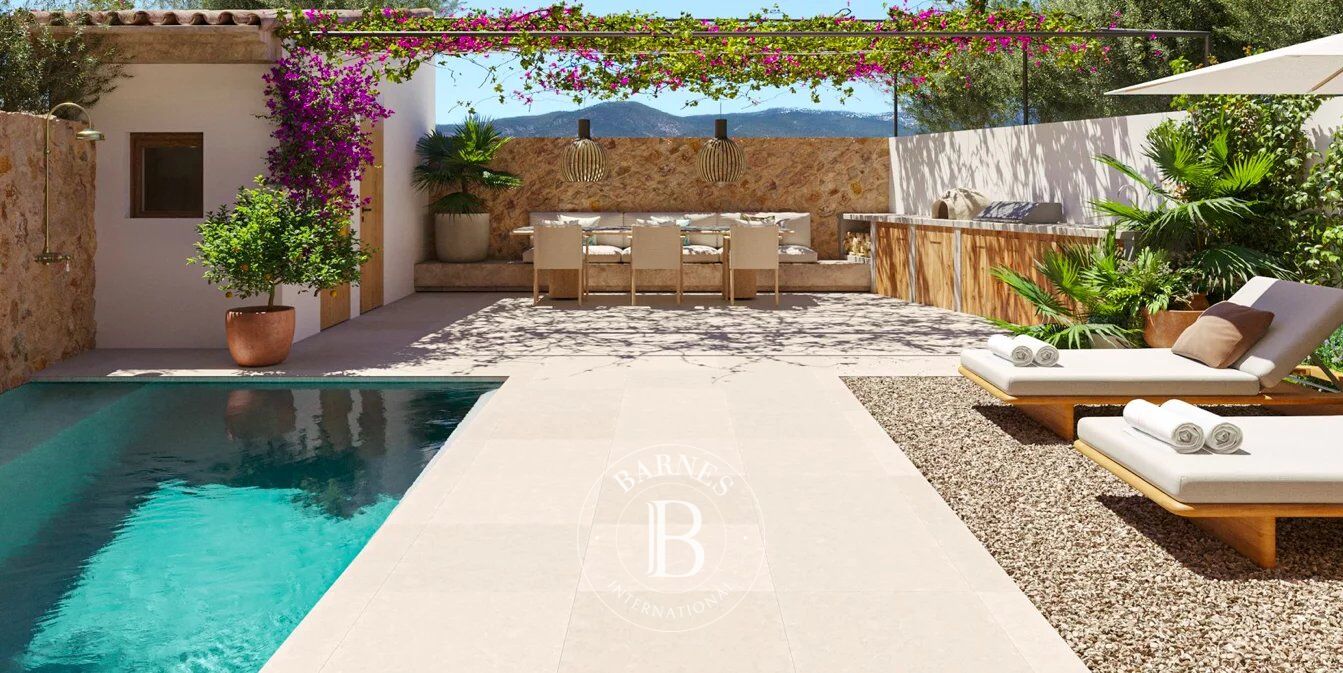 Elegant Three-Level Sustainable Townhouse with Scenic Mountain Views in Santa Maria del Camí - picture 3