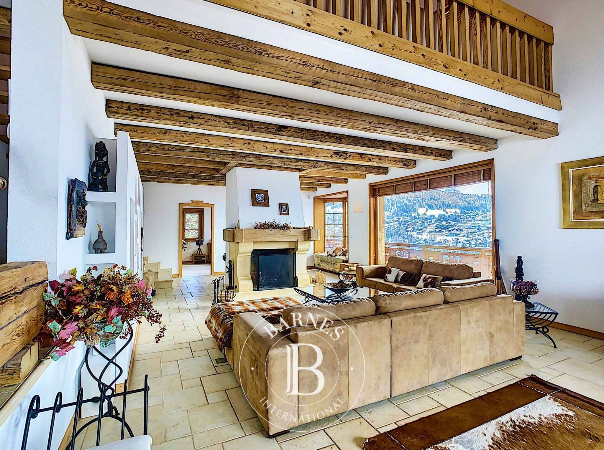 Un chalet d’exception niché dans un écrin de verdure avec vue spectaculaire sur les Alpes - picture 2